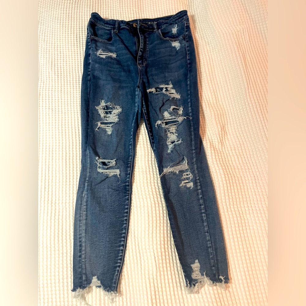 Like New American Eagle Ripped Skinny Jeans. 14 Short. Stone wash Blue. Stretch.